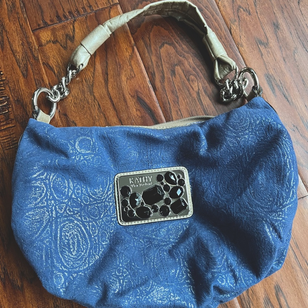 Like new Kathy Van Zeeland Shoulder bag. Bluish purple shiny